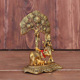 White Whale Kamdhenu Cow with Krishna Standing Under Tree Plying Flute Metal Statue (12 X 8 X 17 cm, Gold)